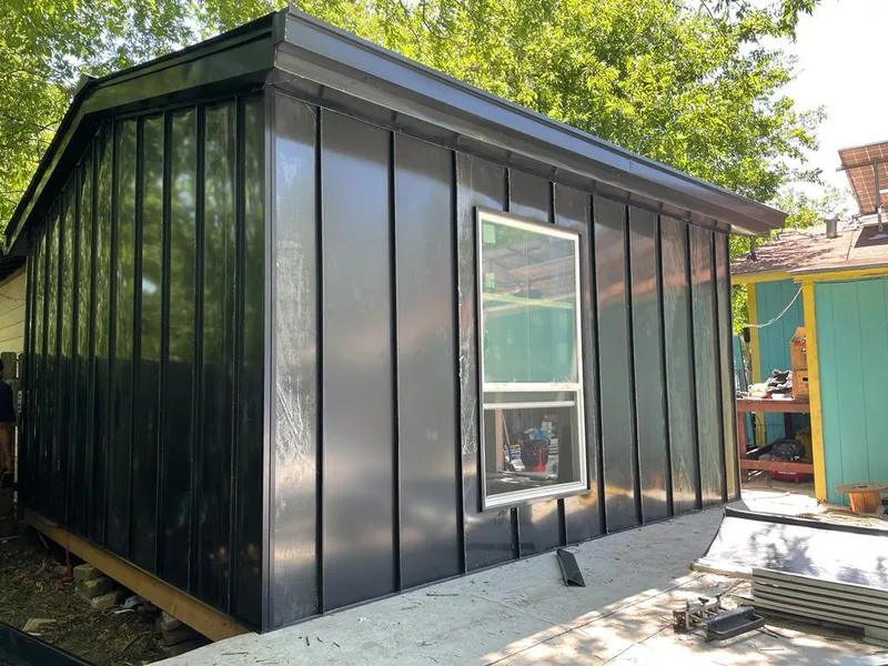 Black standing seam metal wall panels for Roof Inspection in Westminster